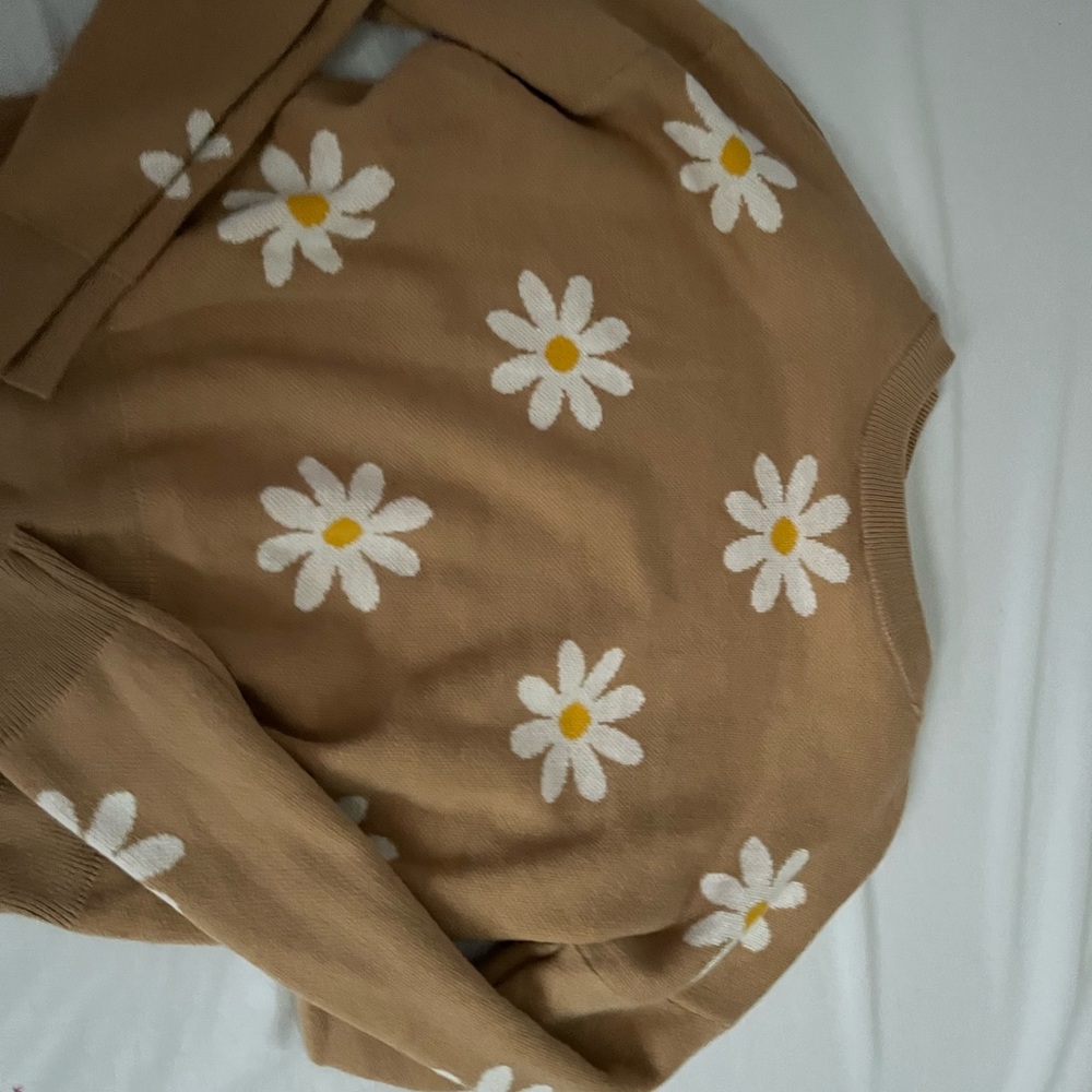 It’s a sweater it’s very cute and fashionable